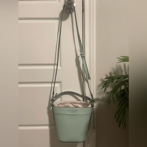 Light blue Kate Spade cross body bucket purse